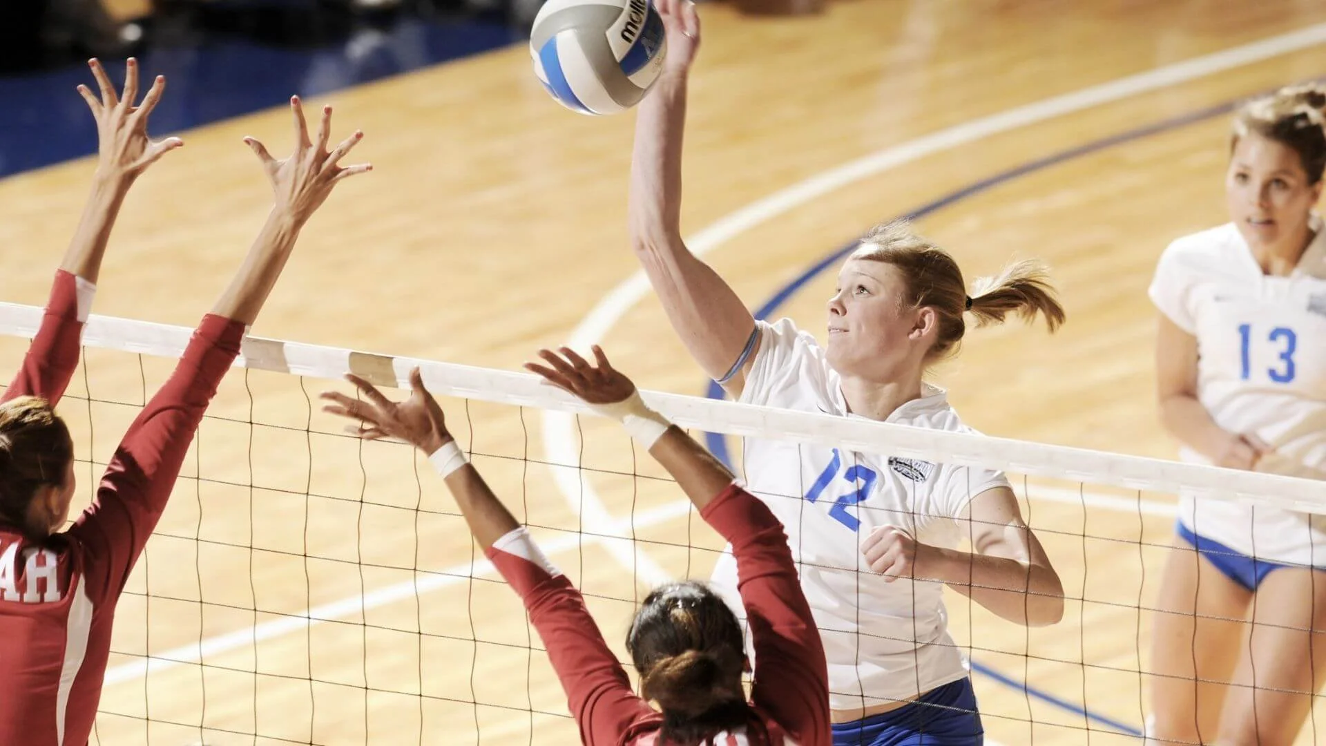 woman playing competitive vollyball