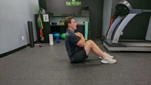 personal trainer showing an exercise
