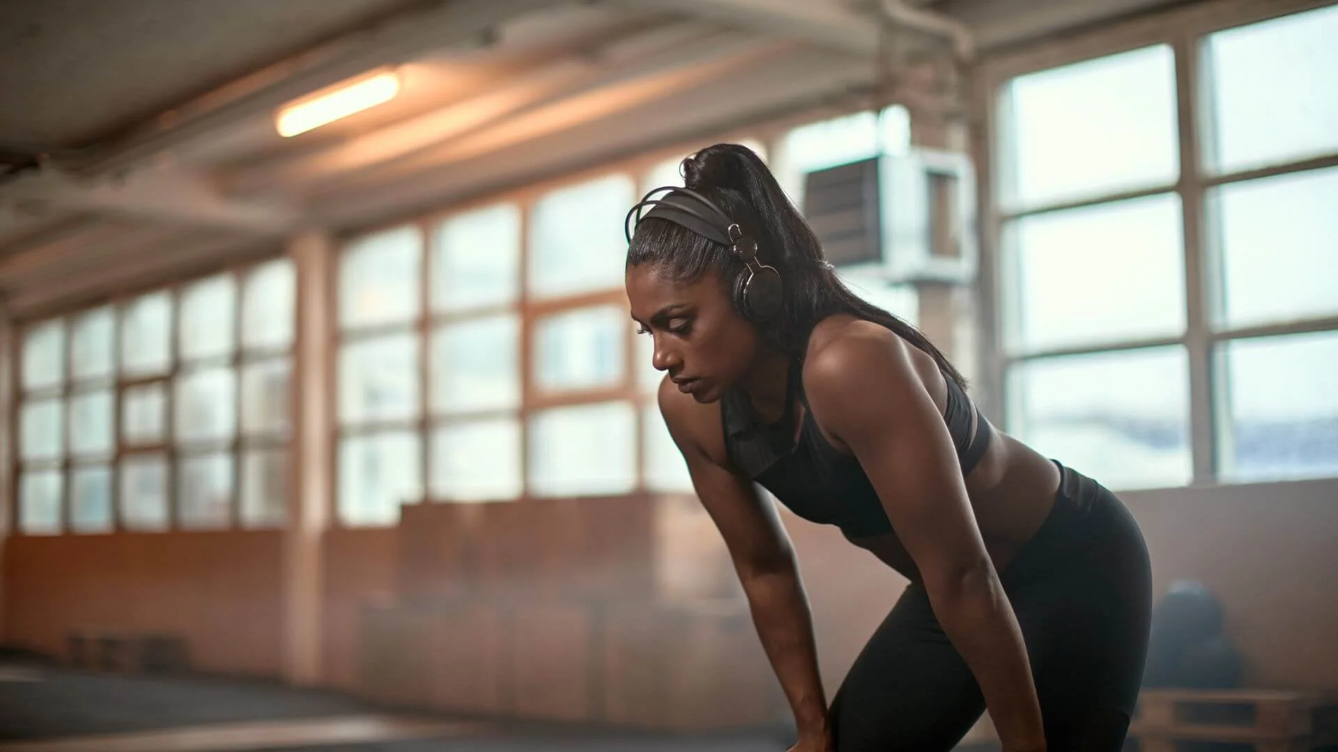 woman taking a break while exercising