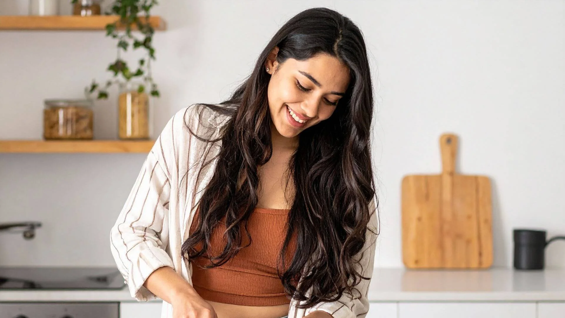 woman cooking healthy food in the kitchen for abs