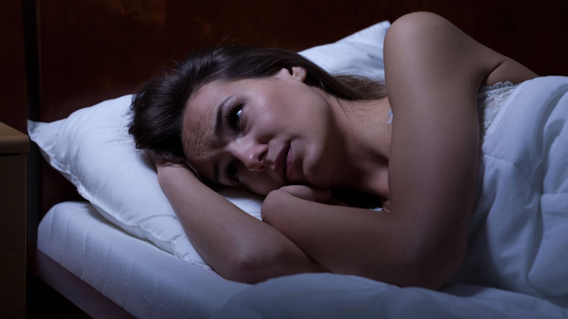 woman struggling to sleep at night