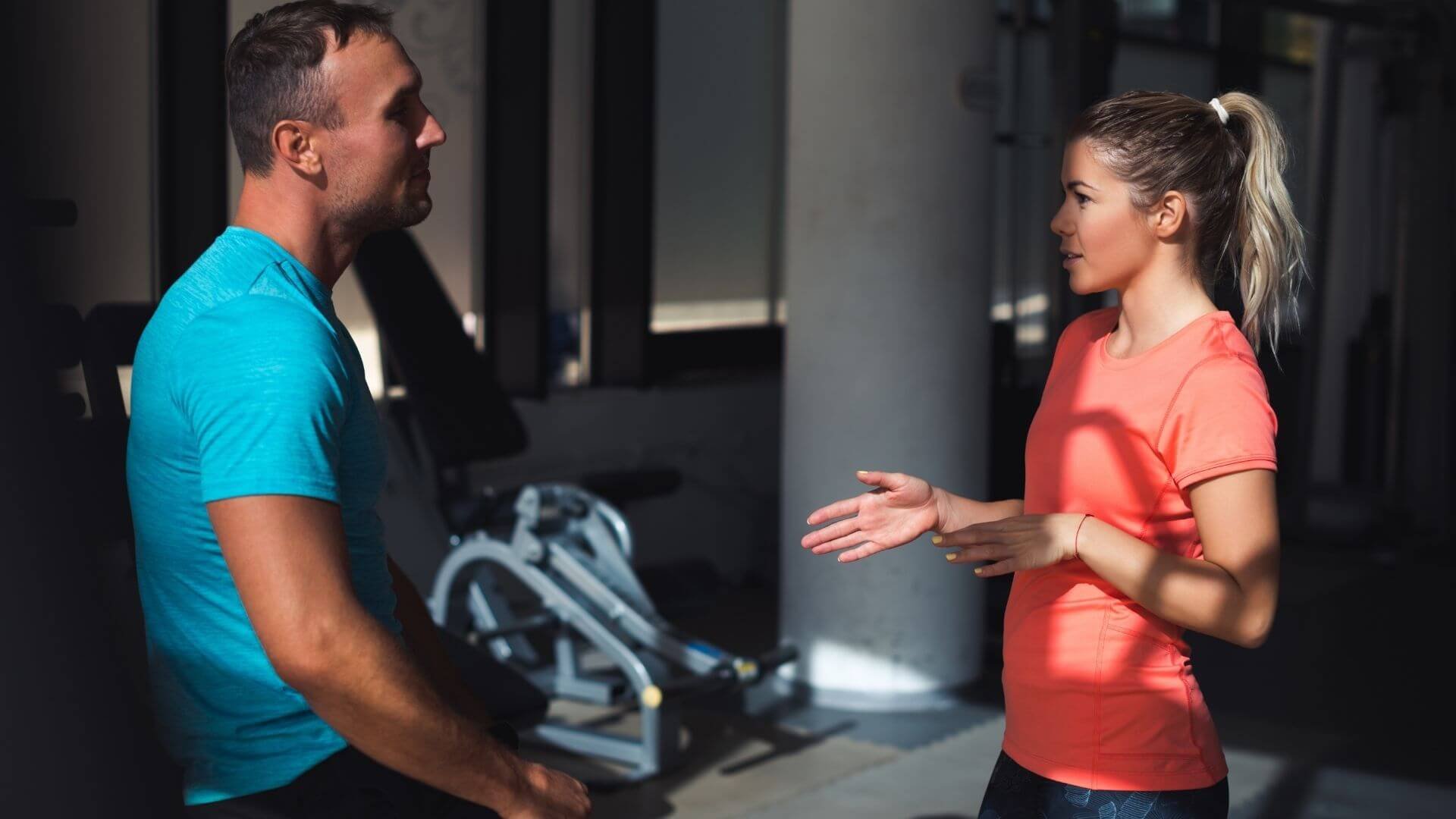 client asking a personal trainer questions