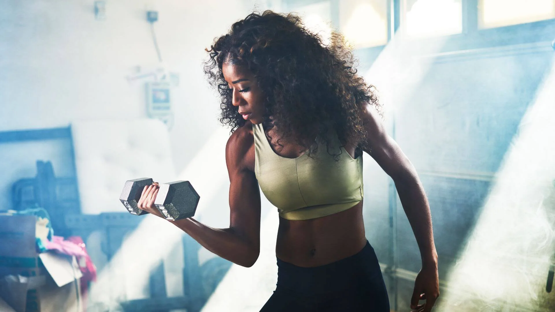 someone holding a weight while exercising