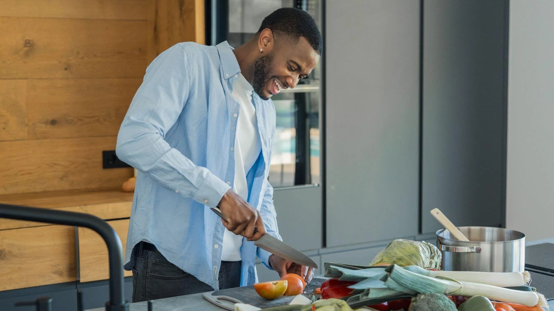 man cutting an apple