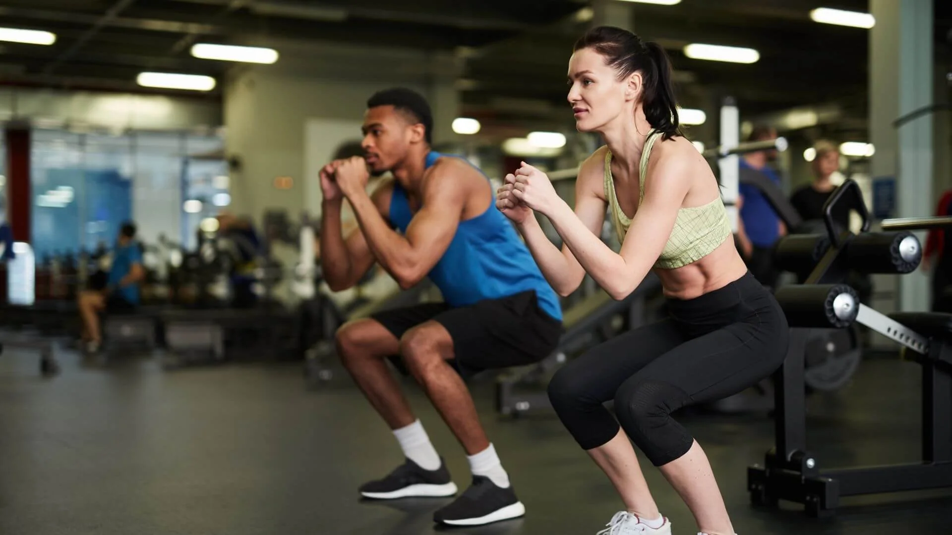 two people exercising together