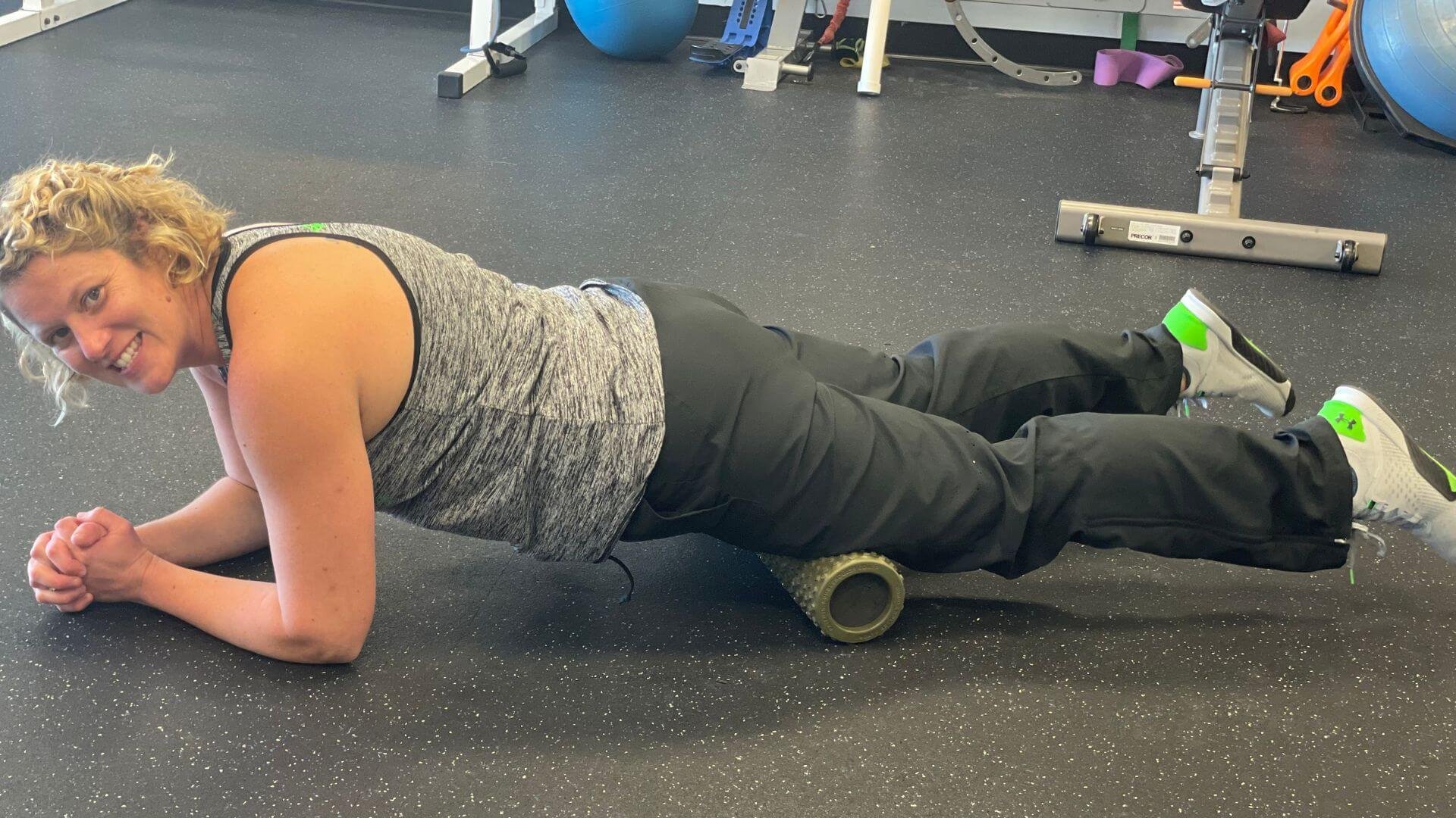 lissa showing a foam rolling position