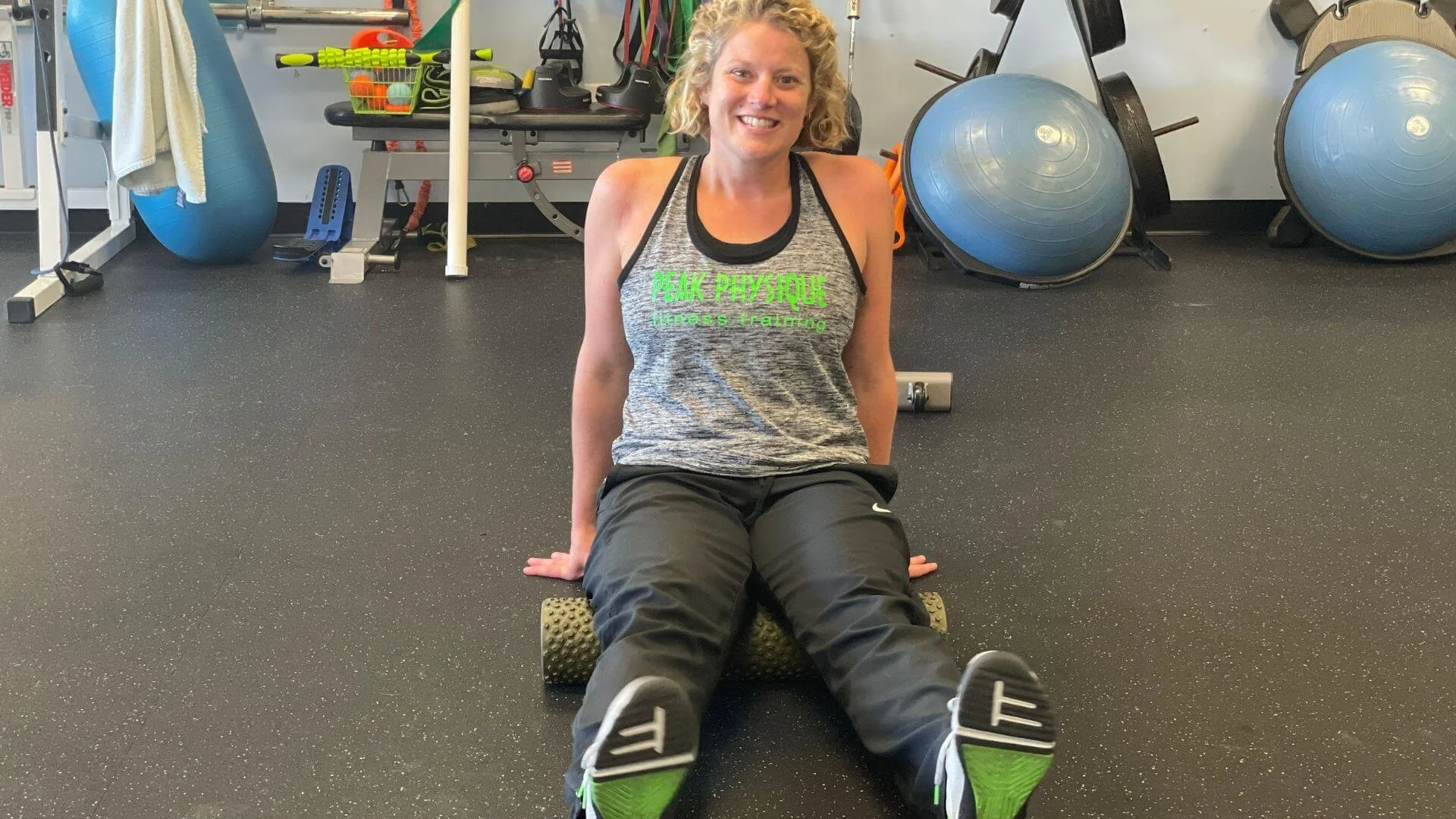 lissa showing a foam rolling position