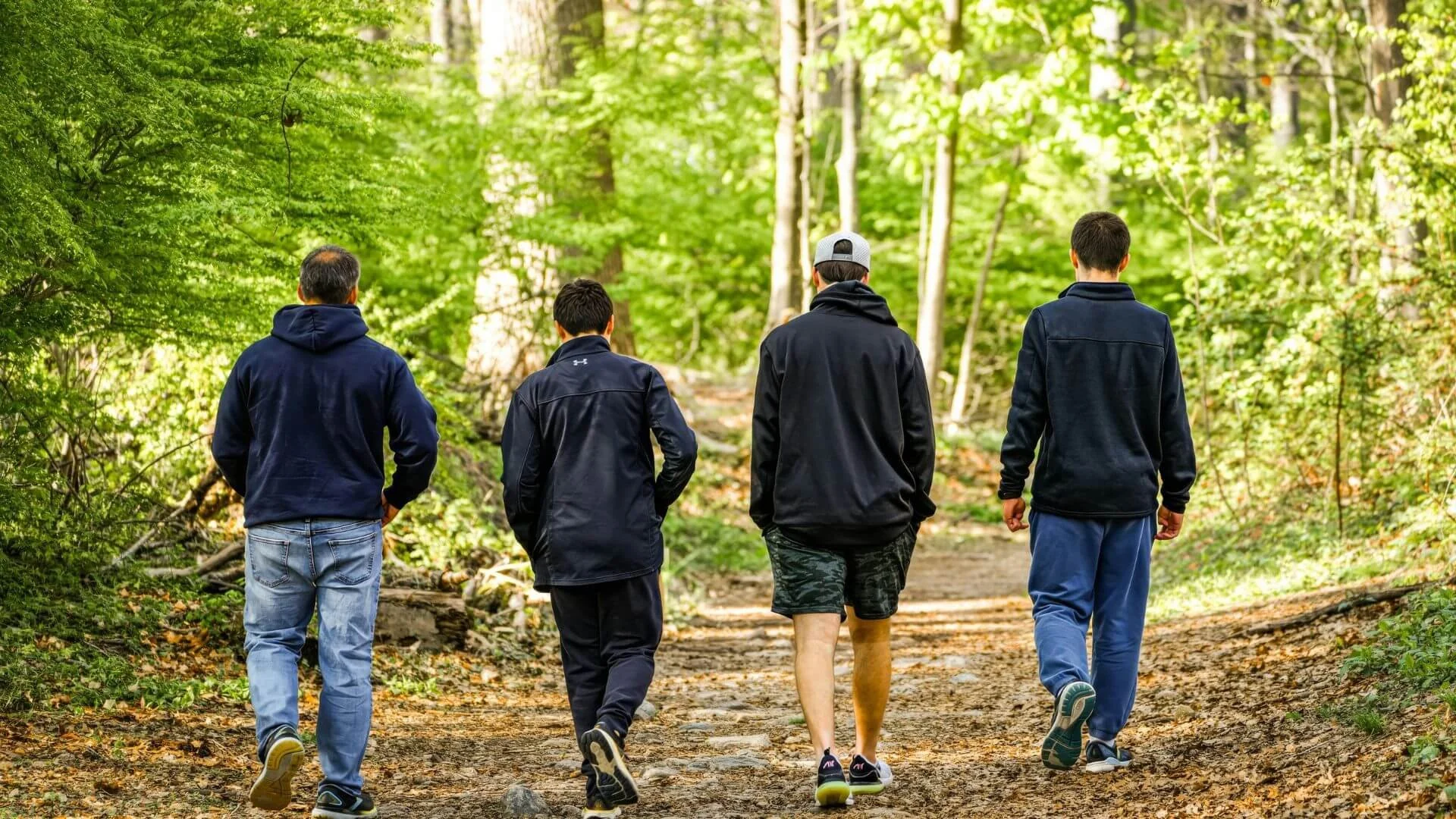 people walking on a trail