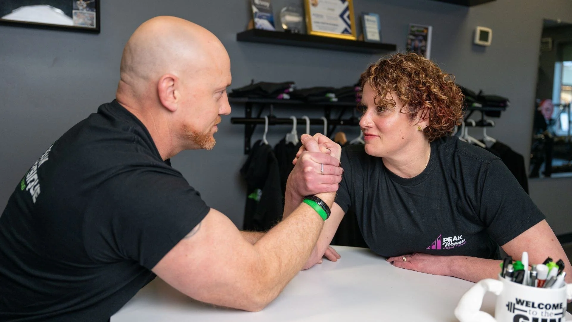Nick and Lissa, co-owners of peak physique arm wrestling