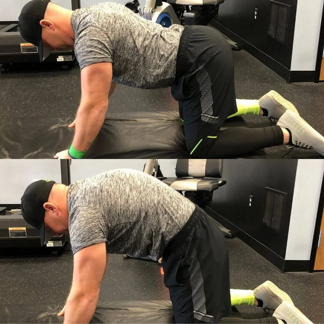 nick, personal trainer in troy, michigan, doing a Cat & Cow