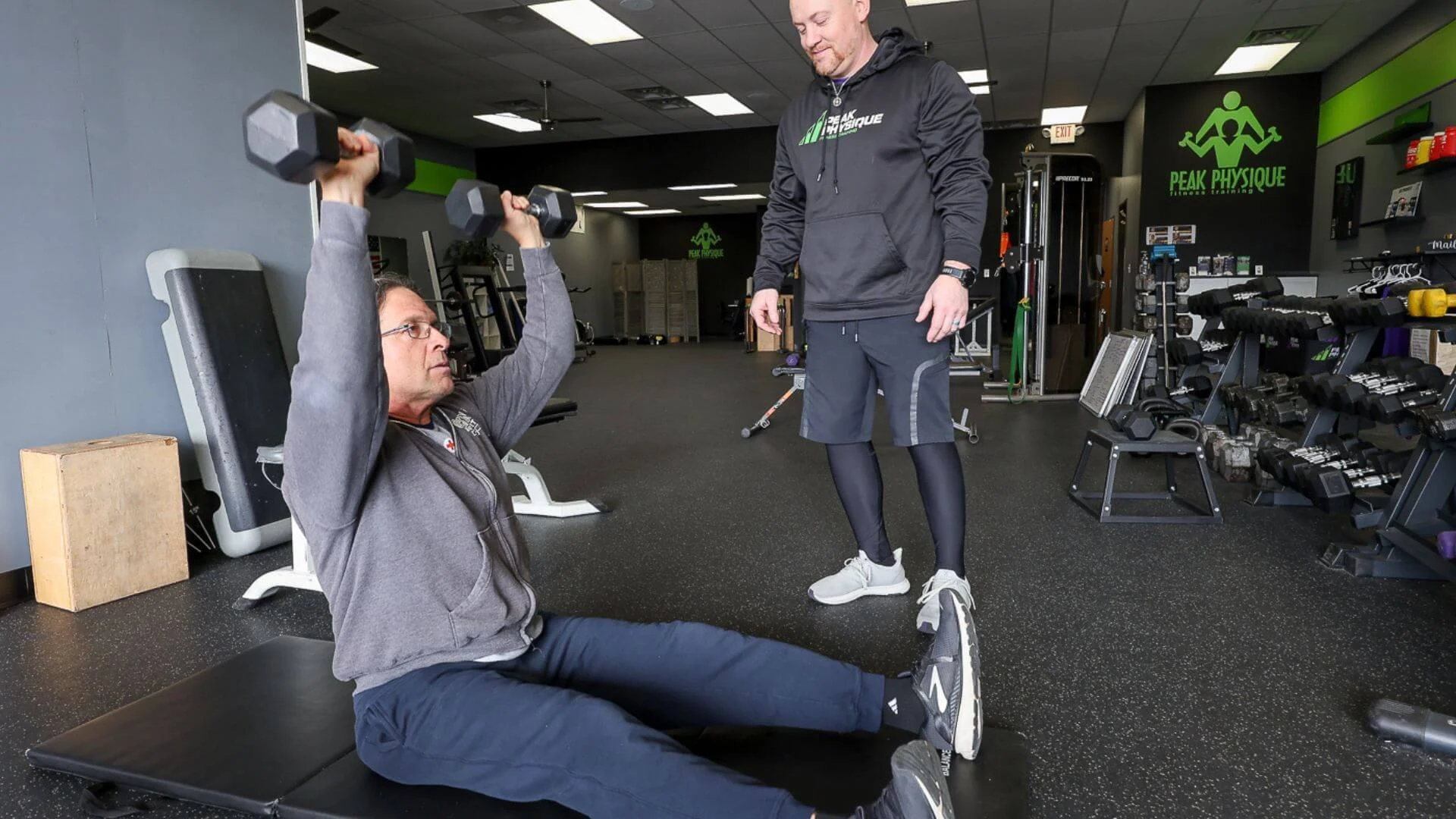 nick, personal trainer in troy watching a client exercise