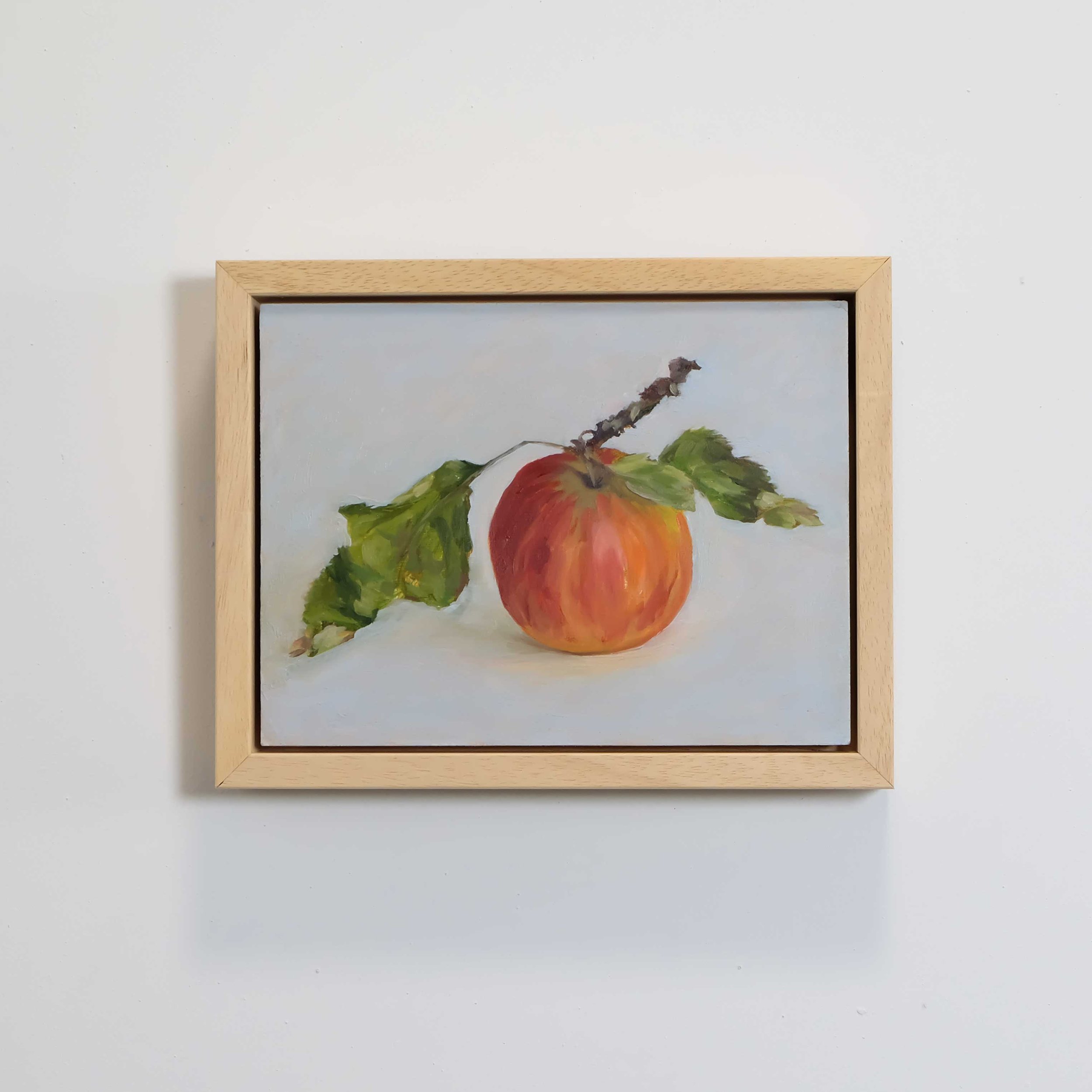 "Red Apple with Leaves"