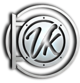 A black circular logo with the letter 'uk' in stylized font at the center, surrounded by a clock-like design, with the word 'tate' written vertically on the side.