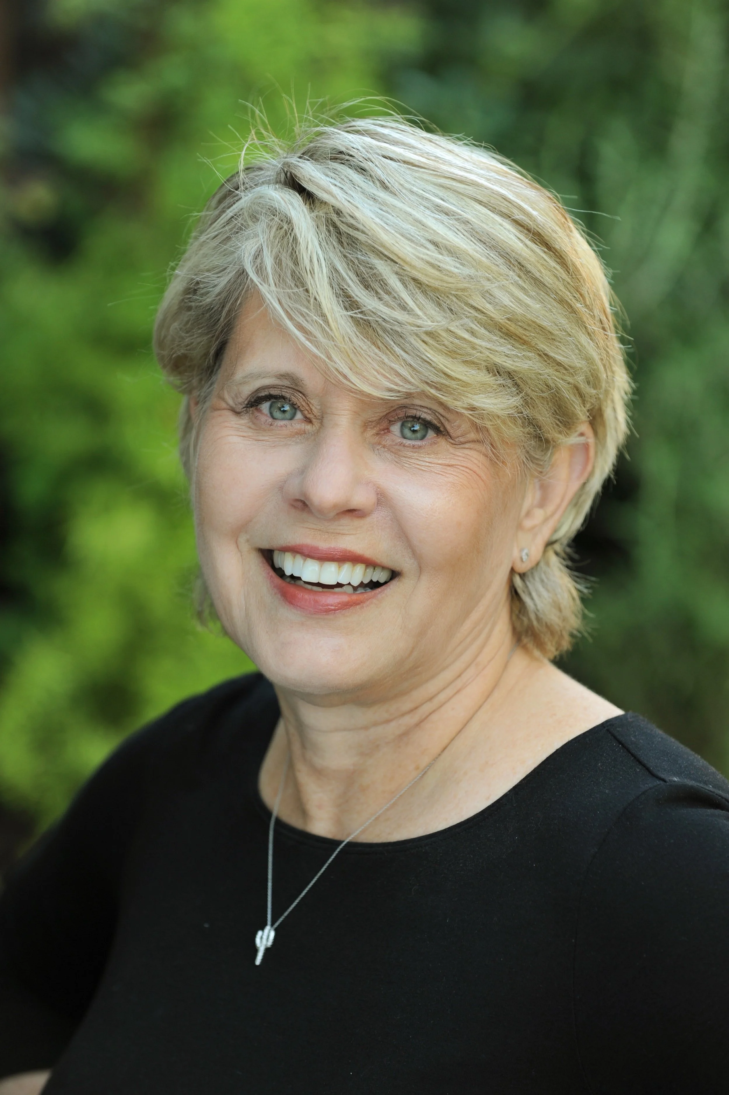 Headshot of Rear Admiral Ronne Froman-Blue, USN, Retired, featured in REVERED: The Power of Female Leadership