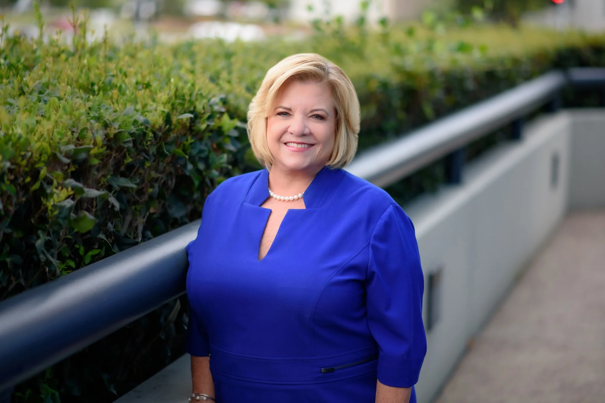 Headshot of Karla Hertzog, Founder of IES, featured in REVERED: The Power of Female Leadership