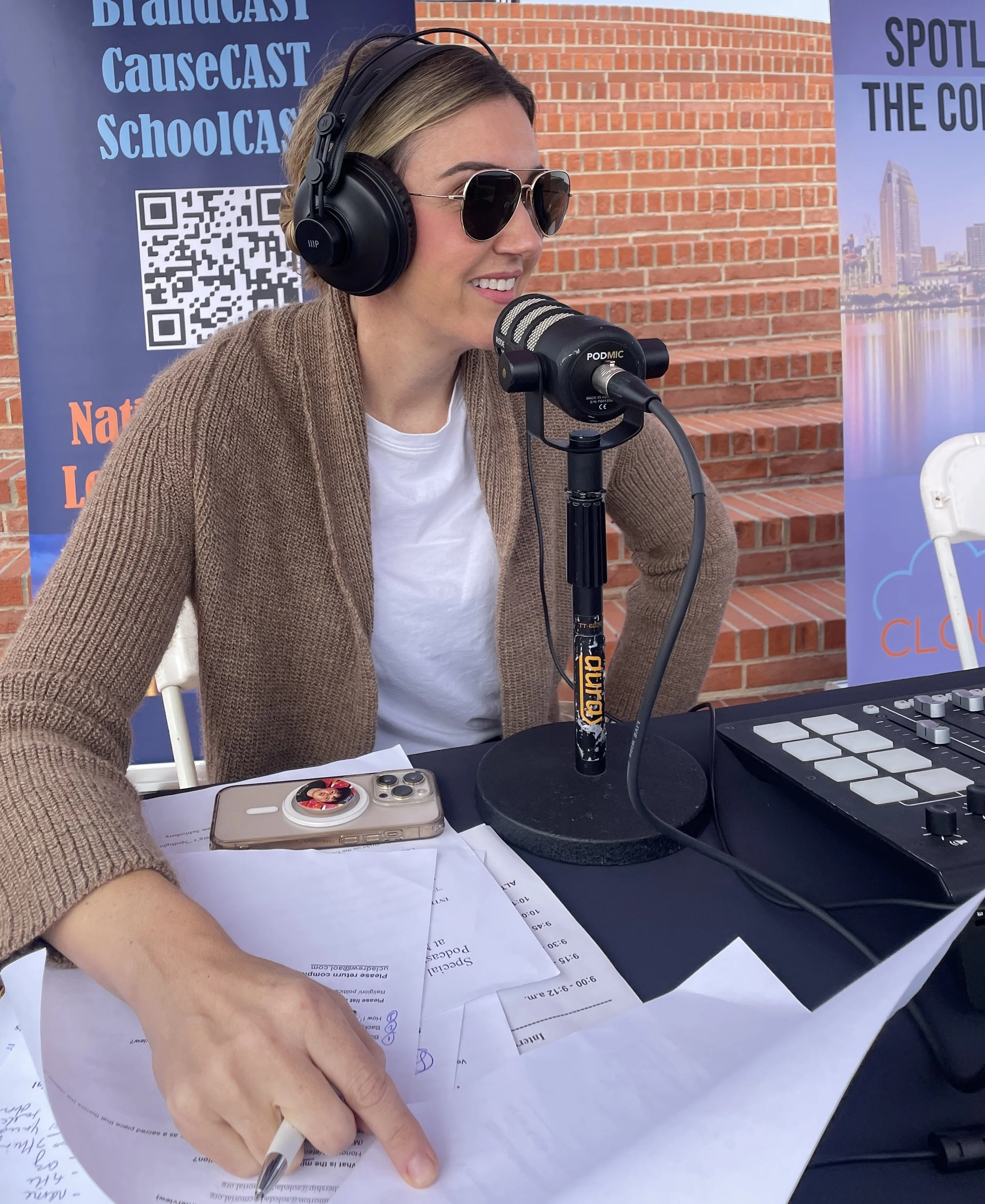 Author and CEO Jamie Moraga smiling while hosting a podcast