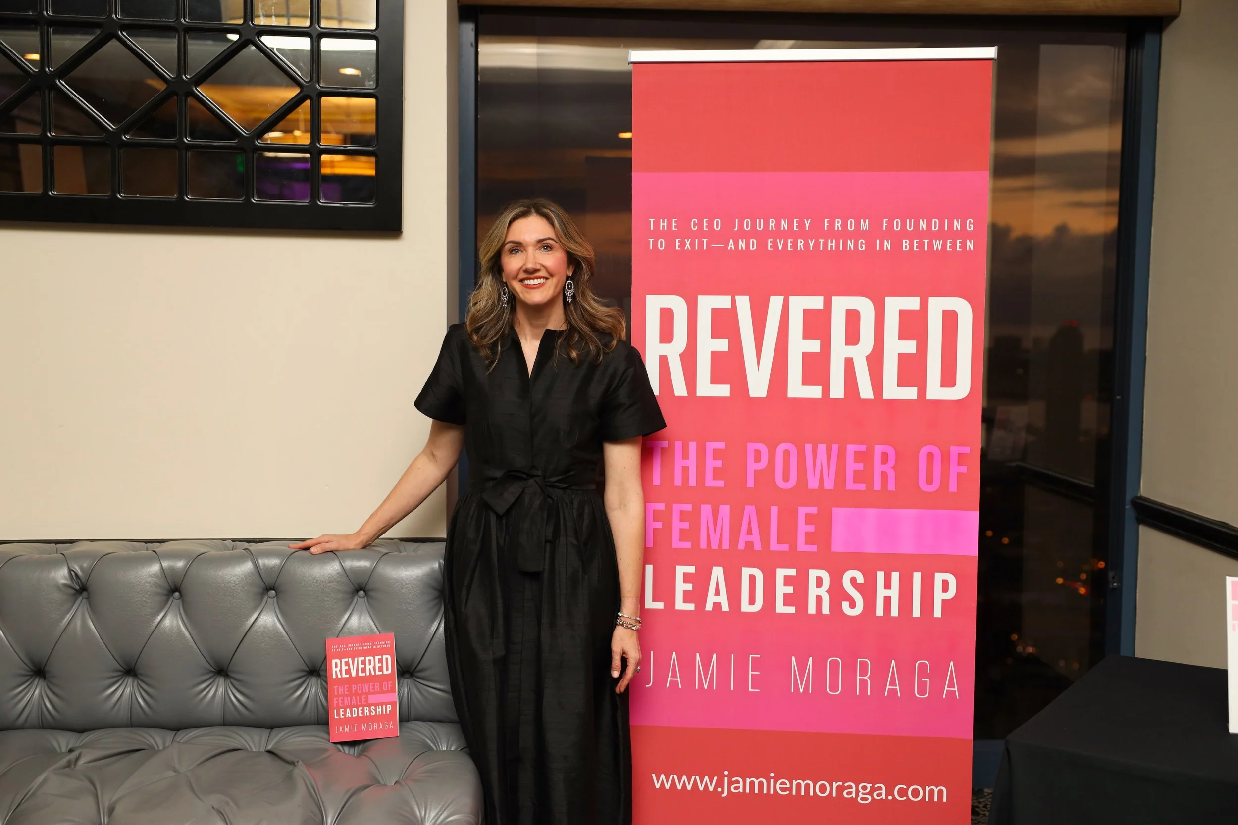 Author and CEO Jamie Moraga smiling at book signing and speaking engagement for REVERED: The Power of Female Leadership