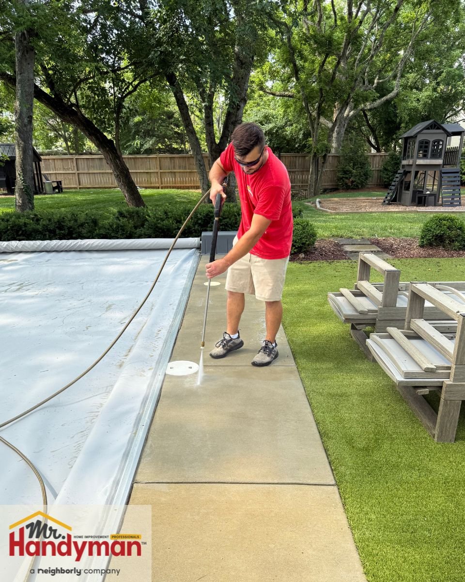 Mr. Handyman technician in Dallas power washing a residential patio – professional exterior cleaning and home maintenance services in Dallas, Plano, Rockwall, and Southwest Dallas County.