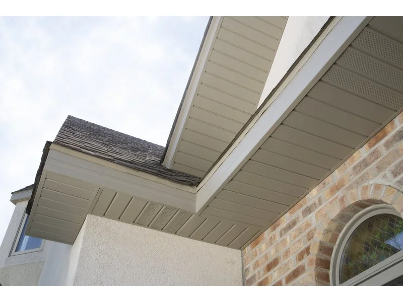 Repaired and freshly painted soffits and fascia on a Largo home exterior