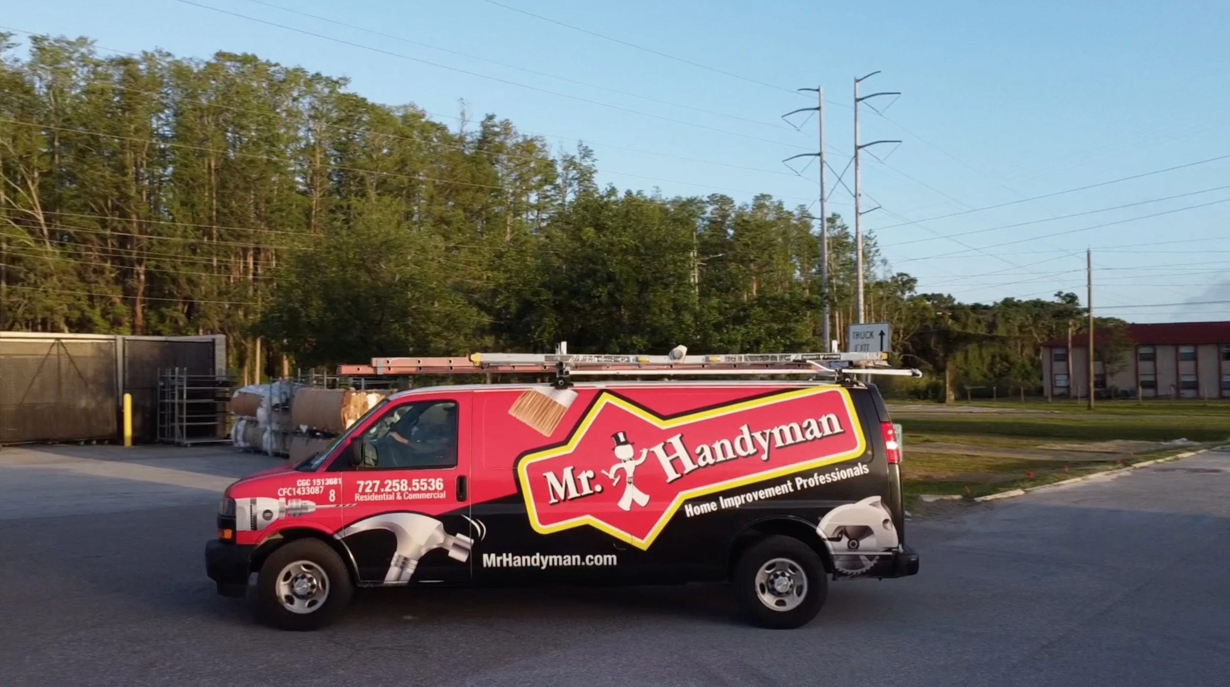 Branded Mr. Handyman service van for Tampa and Clearwater, showing professional home repair and improvement vehicle on site.