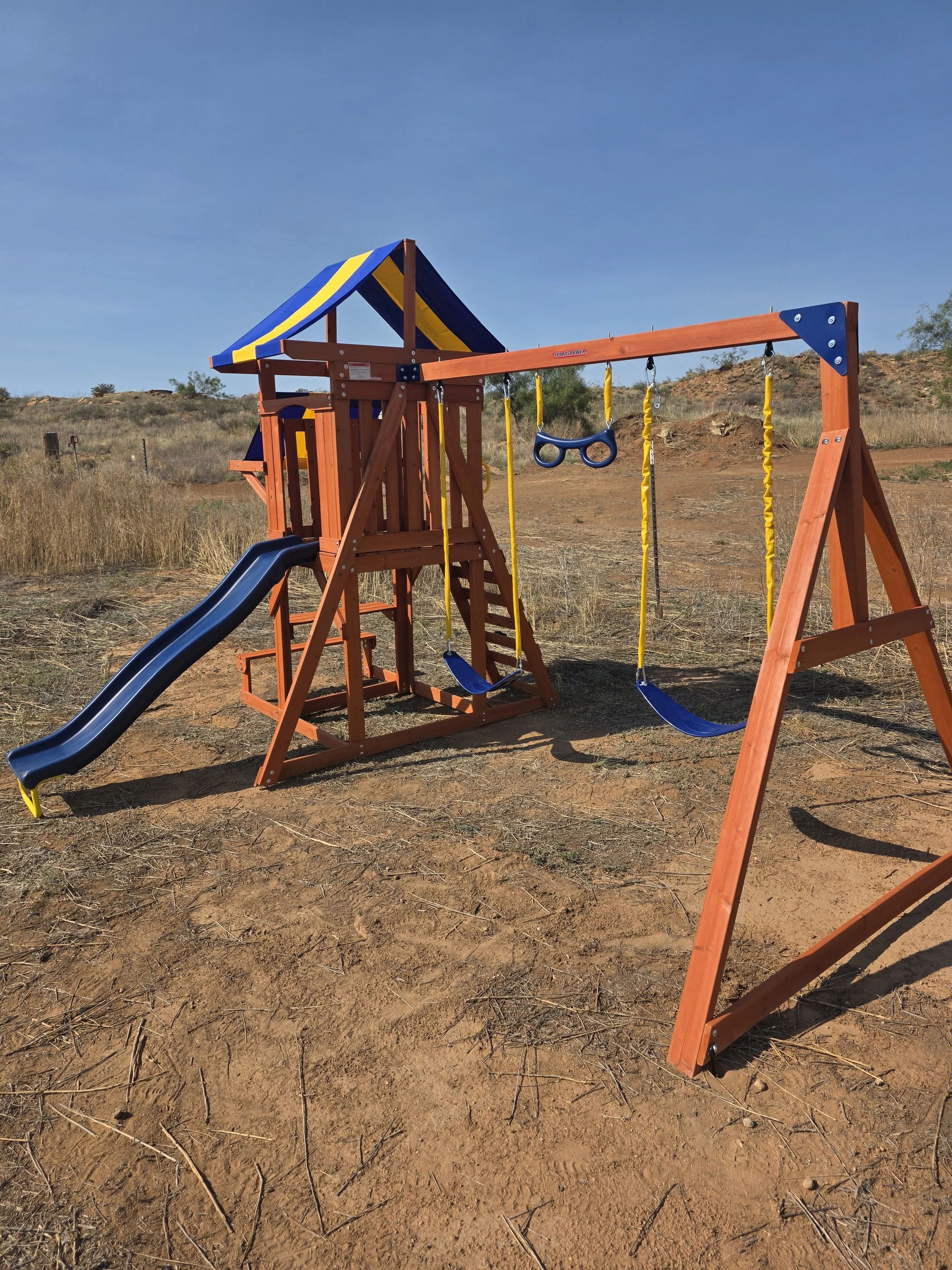 Expertly assembled this backyard playset according to the manufacturer's specifications, ensuring every component was securely installed and ready for safe family fun. 