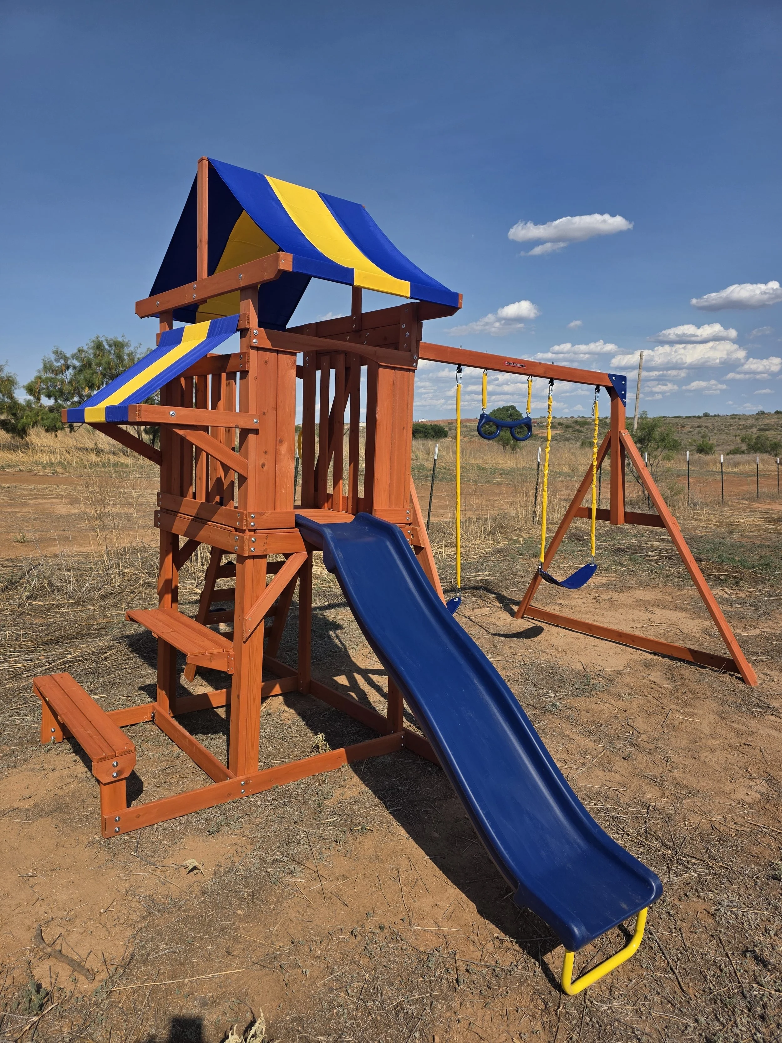 Expertly assembled this backyard playset according to the manufacturer's specifications, ensuring every component was securely installed and ready for safe family fun. 
