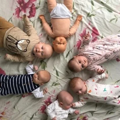 Infant Massage in Warwickshire designed to support bonding, relaxation and wellbeing. Root & Rise