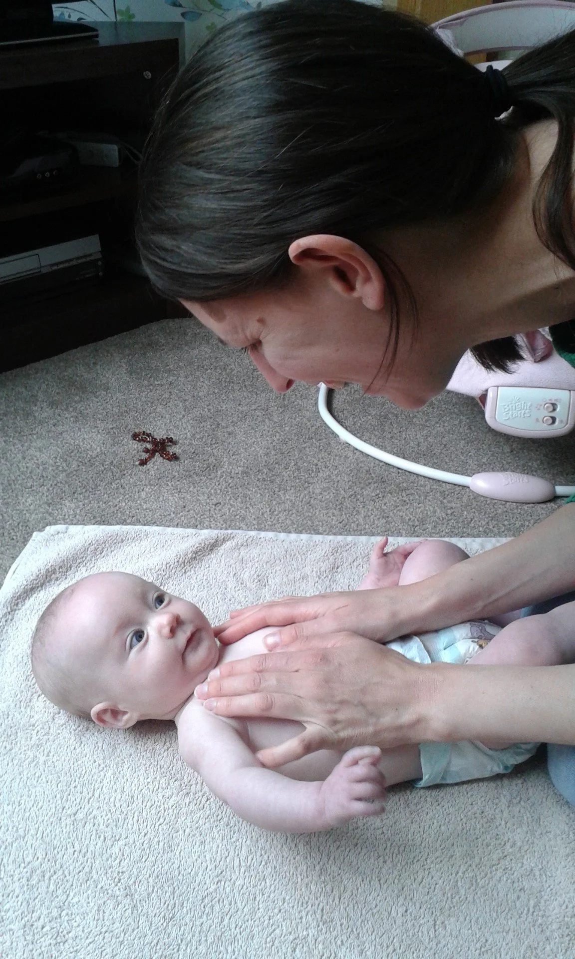 Gentle infant massage session at Root & Rise, Warwickshire