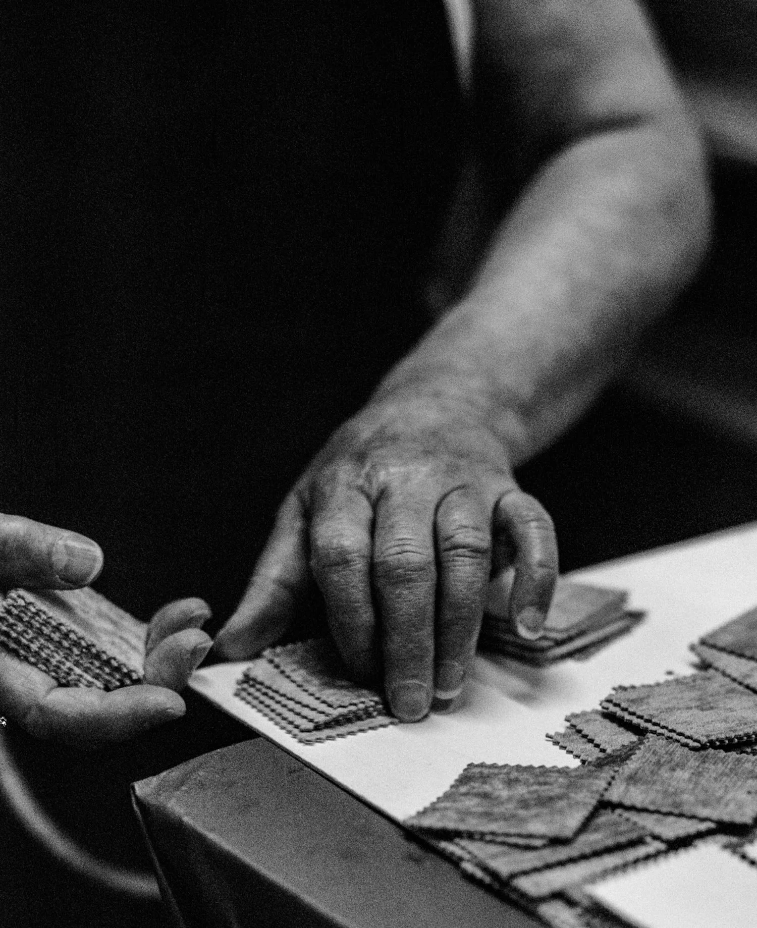 Team member handling swatches