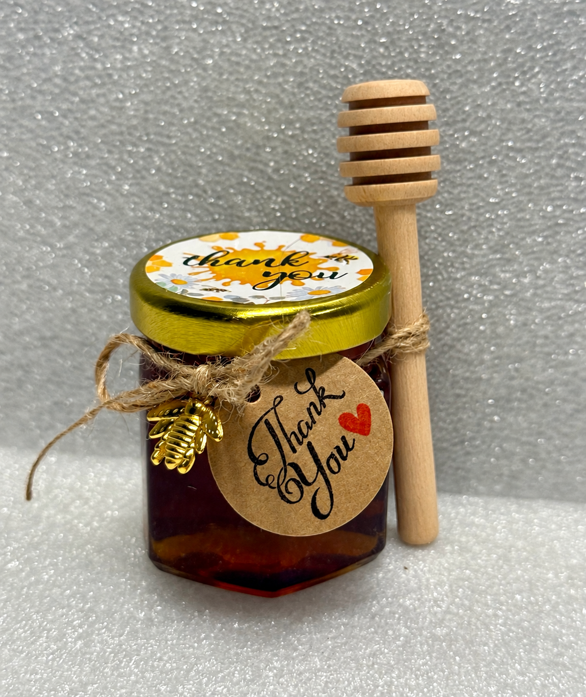 Unwrapped wooden honey dipper.png
