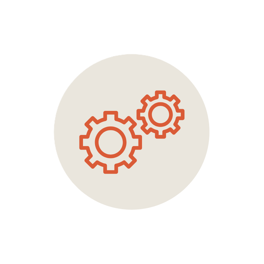 Two orange gears within a light gray circle on a black background.