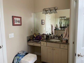 BR vanity next to commode door - Eileen McMyler.jpg