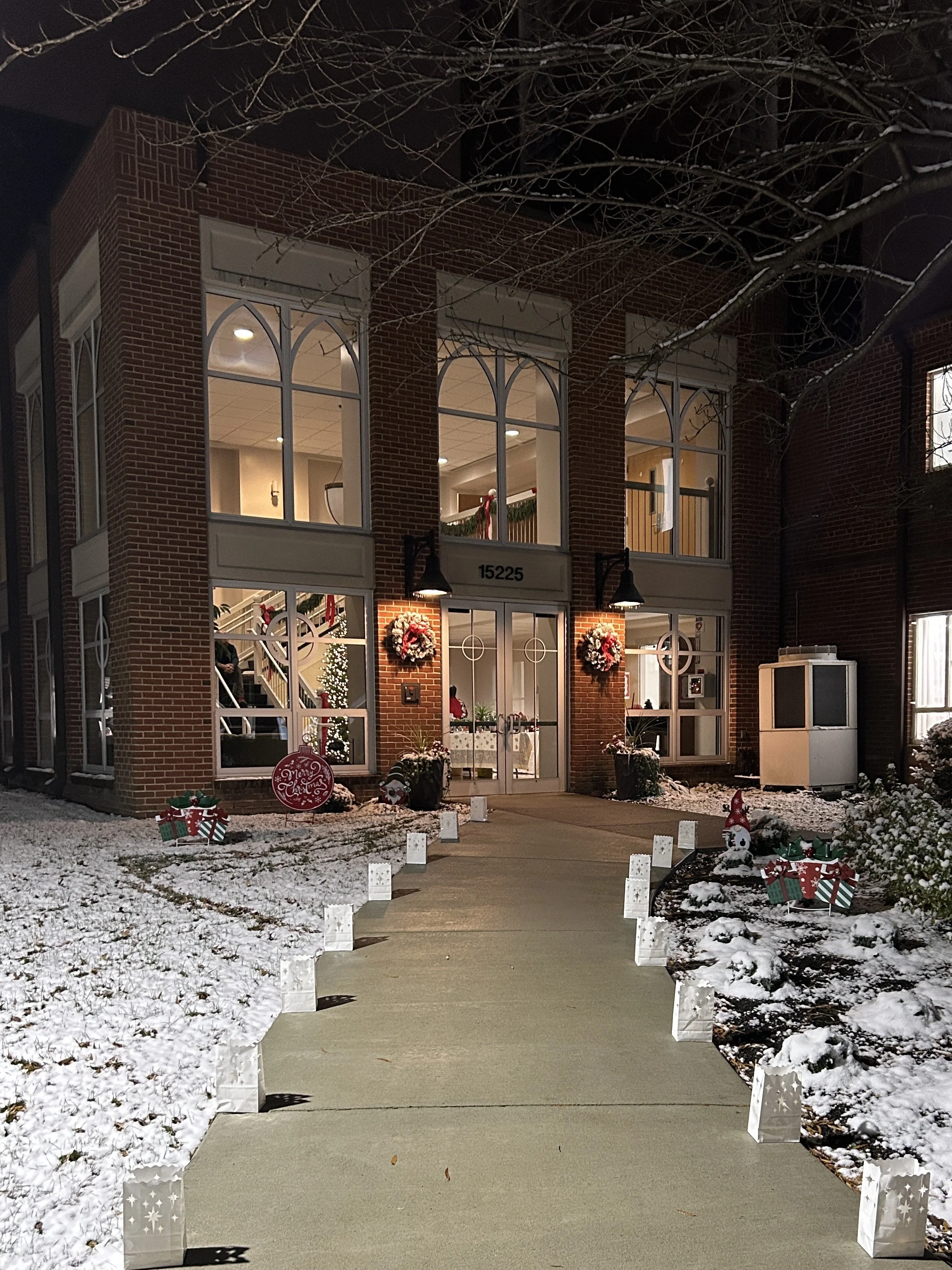 How can you pass up Winterfest with an inviting scene like this .... lanterns lighting the entrance and a light snowfall to help you feel the spirit of the holiday season.
