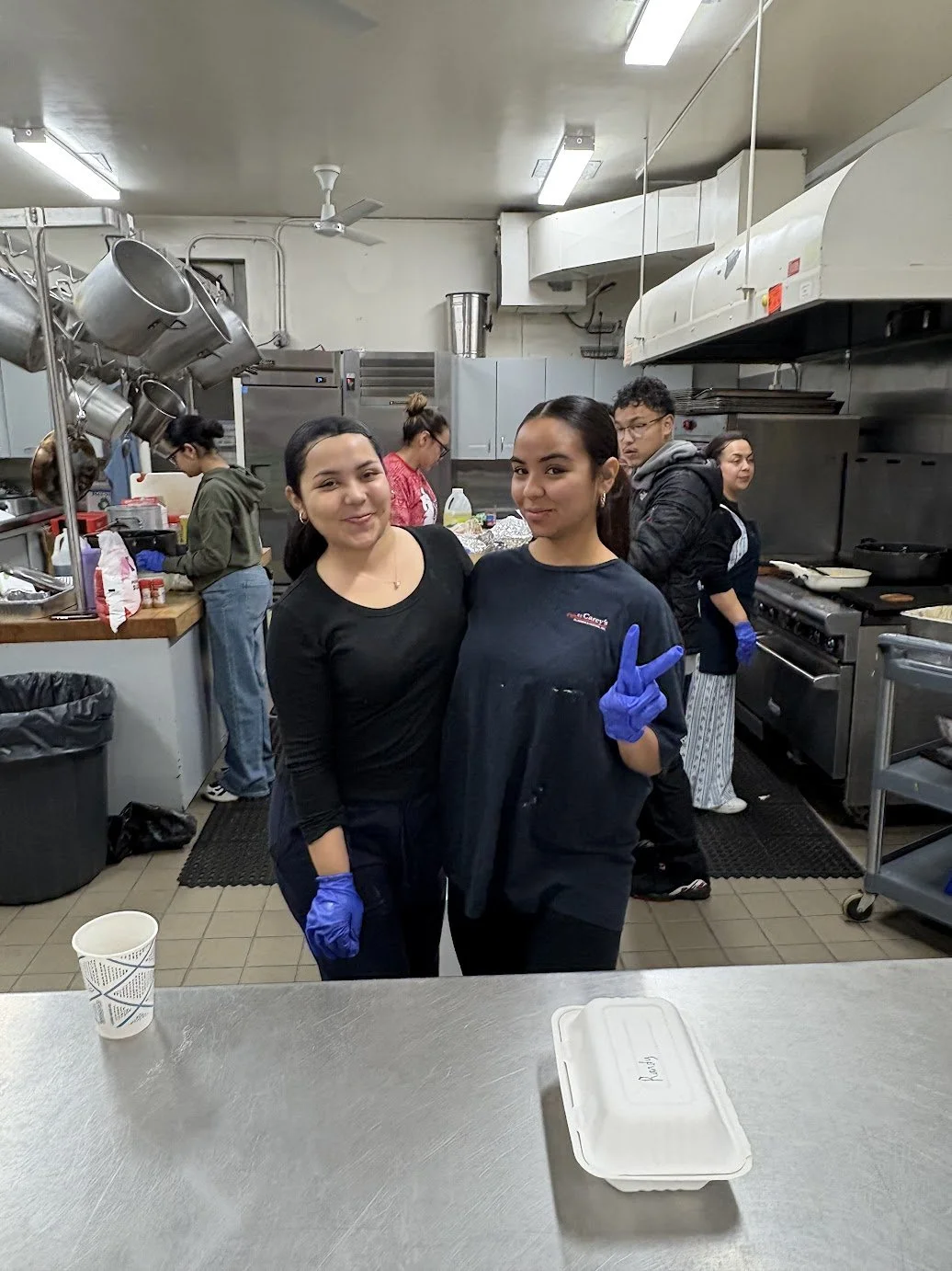 A great team prepares a delicious Latin American dinner on Friday and serves it with a smile!
