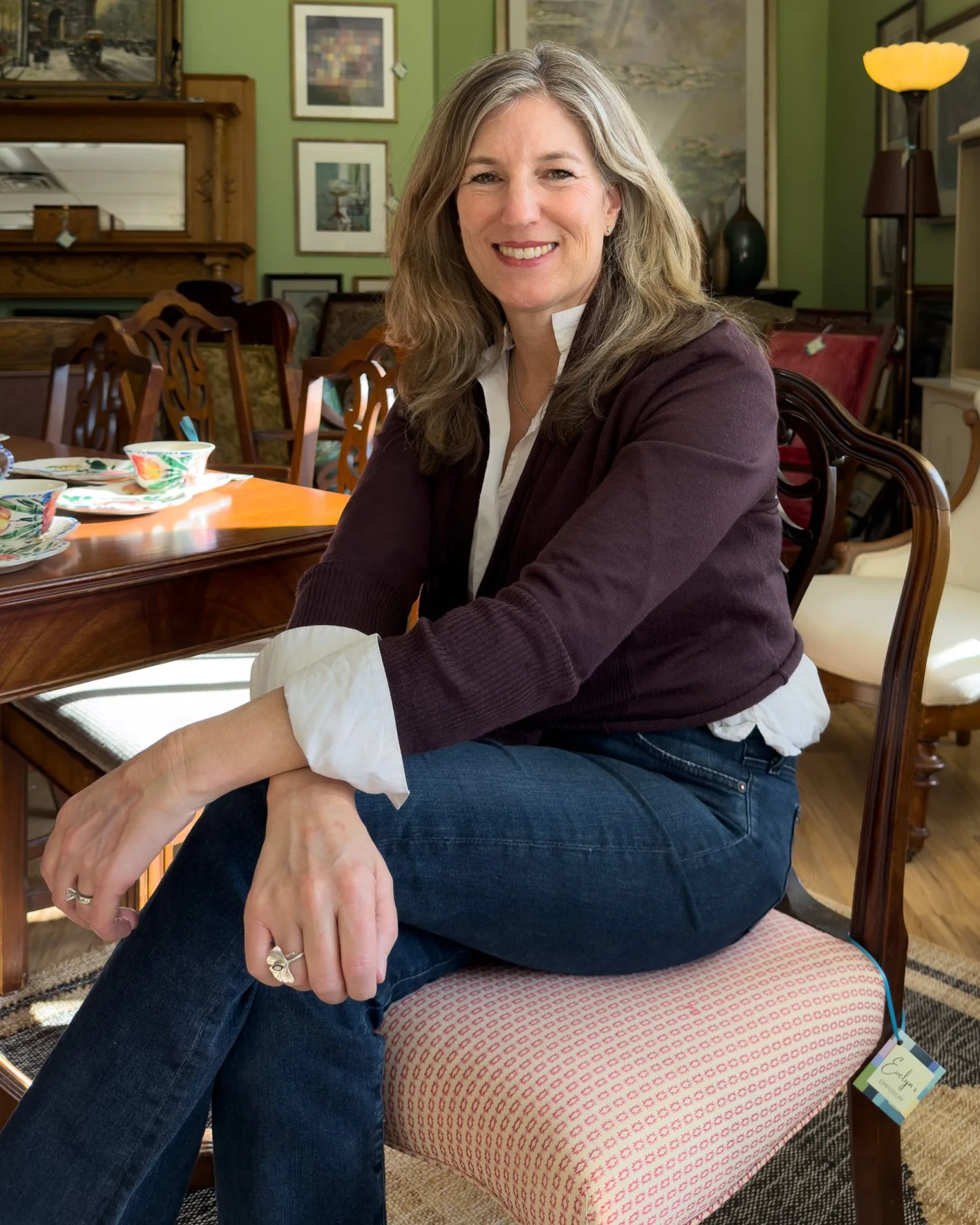 Interior designer Deanna Lillemoe seated in her shop Evelyn's Emporium, Saint Paul MN