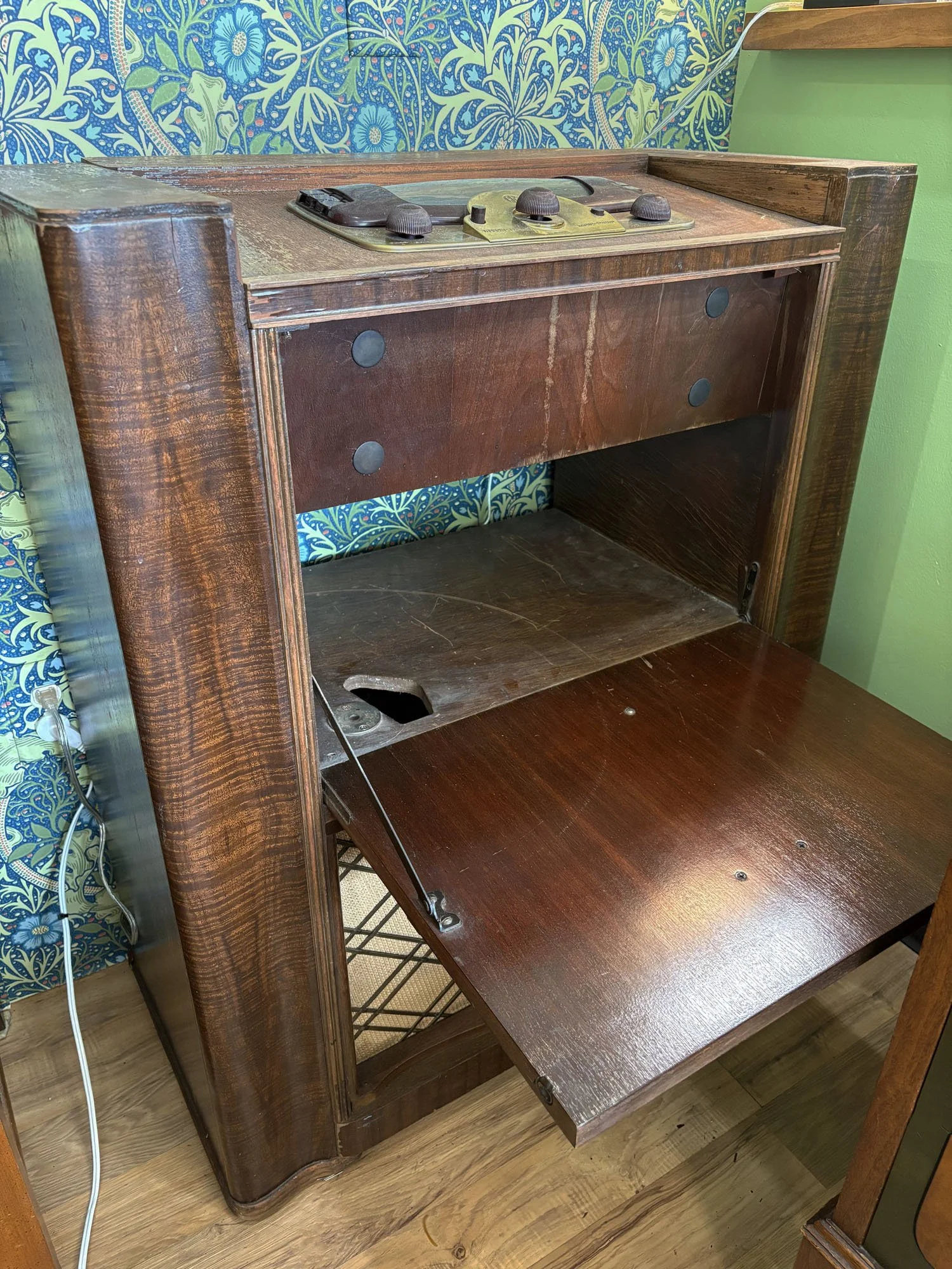 1950s Zenith radio phonograph console with burled wood and brass diamond-lattice grille, detail of open front, Evelyn's Emporium Saint Paul