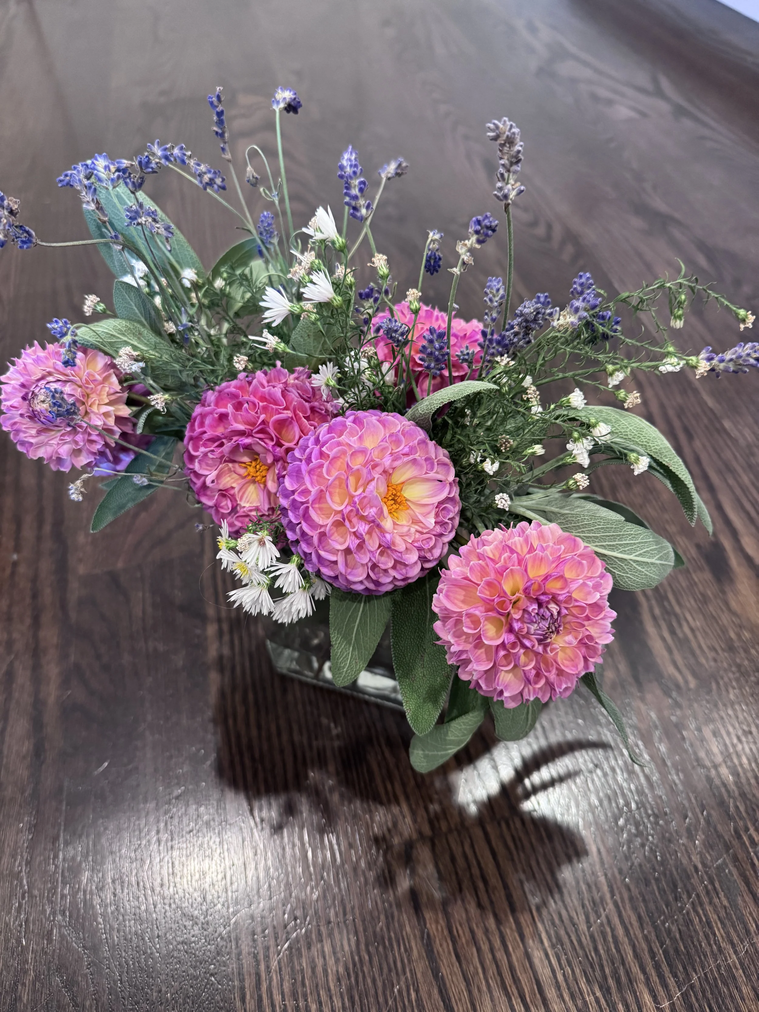 A fall bouquet of dahlias, lavender, asters and sage