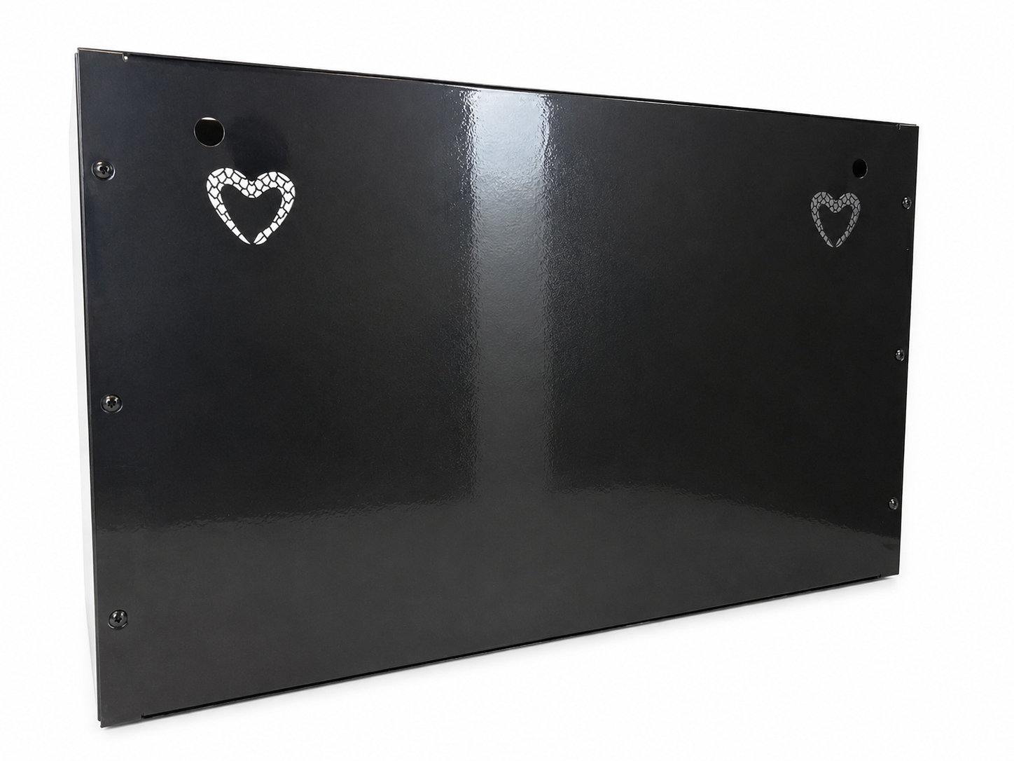 A black metal panel with two heart-shaped cutouts, each outlined with small hexagonal patterns, and multiple small mounting holes.