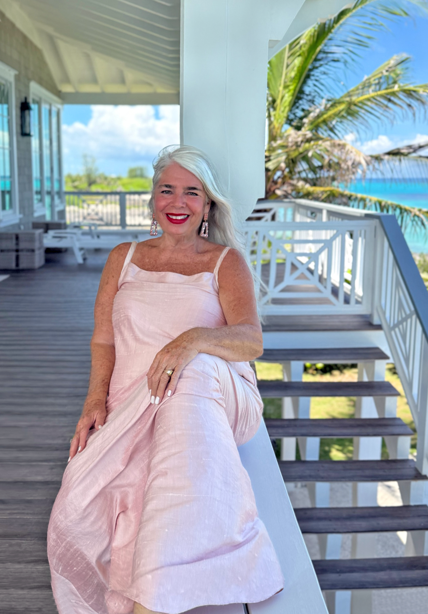 sand so sea wedding day dress sitting on porch 1.png