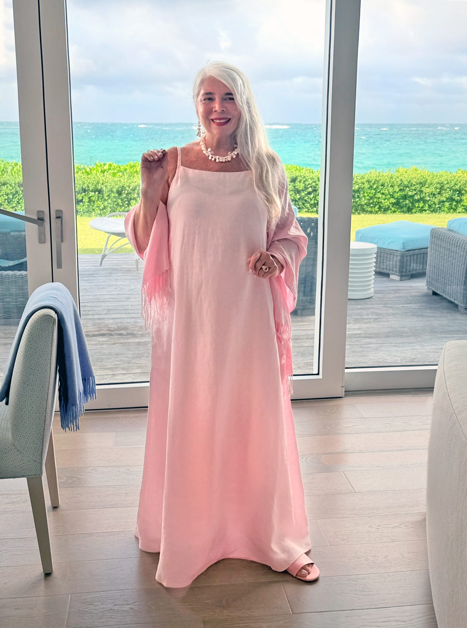 carrie and ivan wedding pink linen dress beach house 2.png