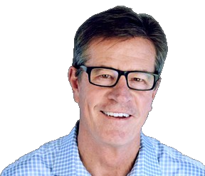 A smiling middle-aged man with dark hair, glasses, and a blue checked shirt against a white background.