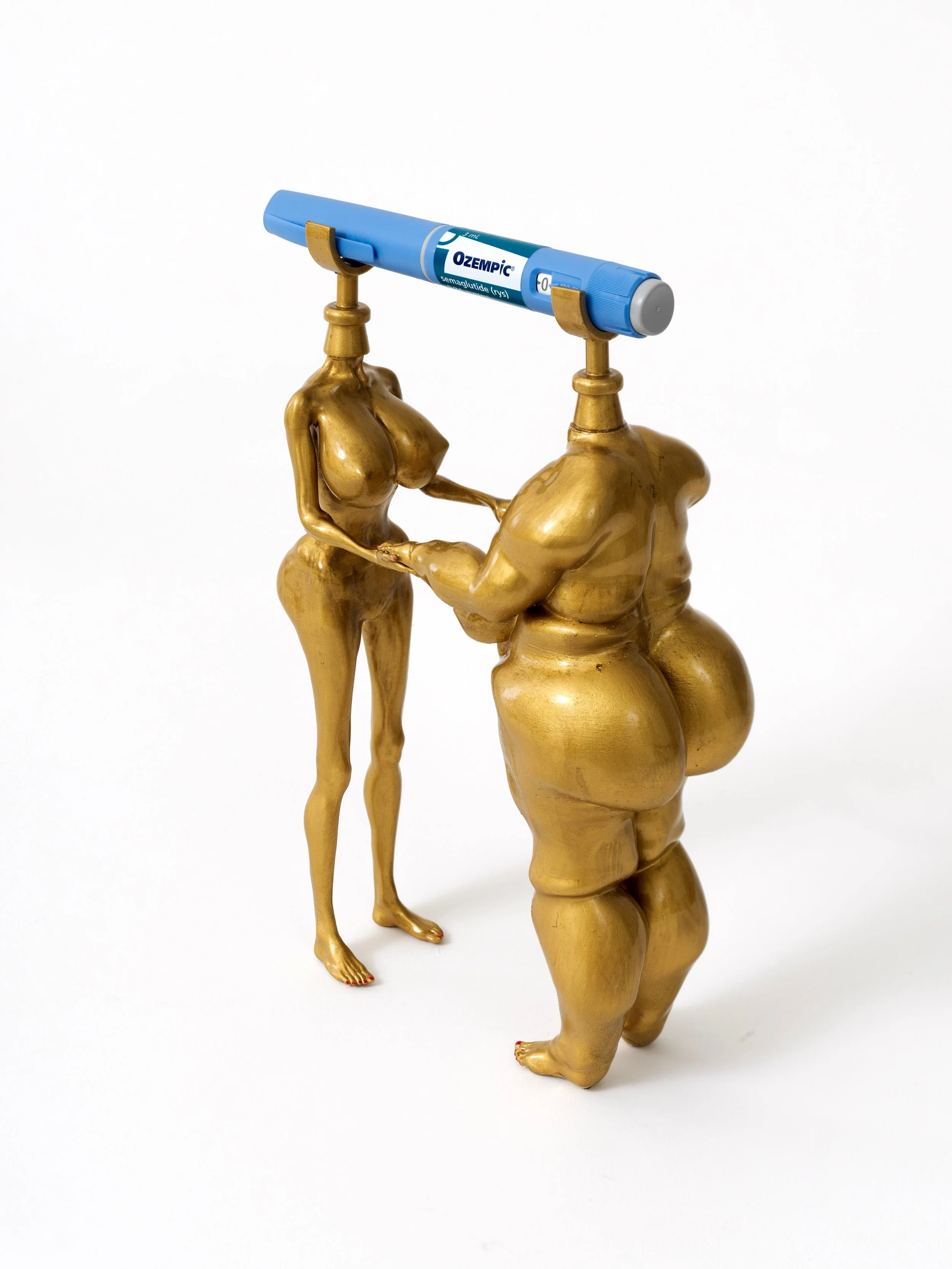 Ozempic Ständer (Spritz Dich Schlank), 2026, Resin, ballpoint pen, polyurethane, acrylic, 24k liquid gold finish, 25 x 17 x 8 cm, 9 ⅞ × 6 ⅝ × 3 ⅛ in