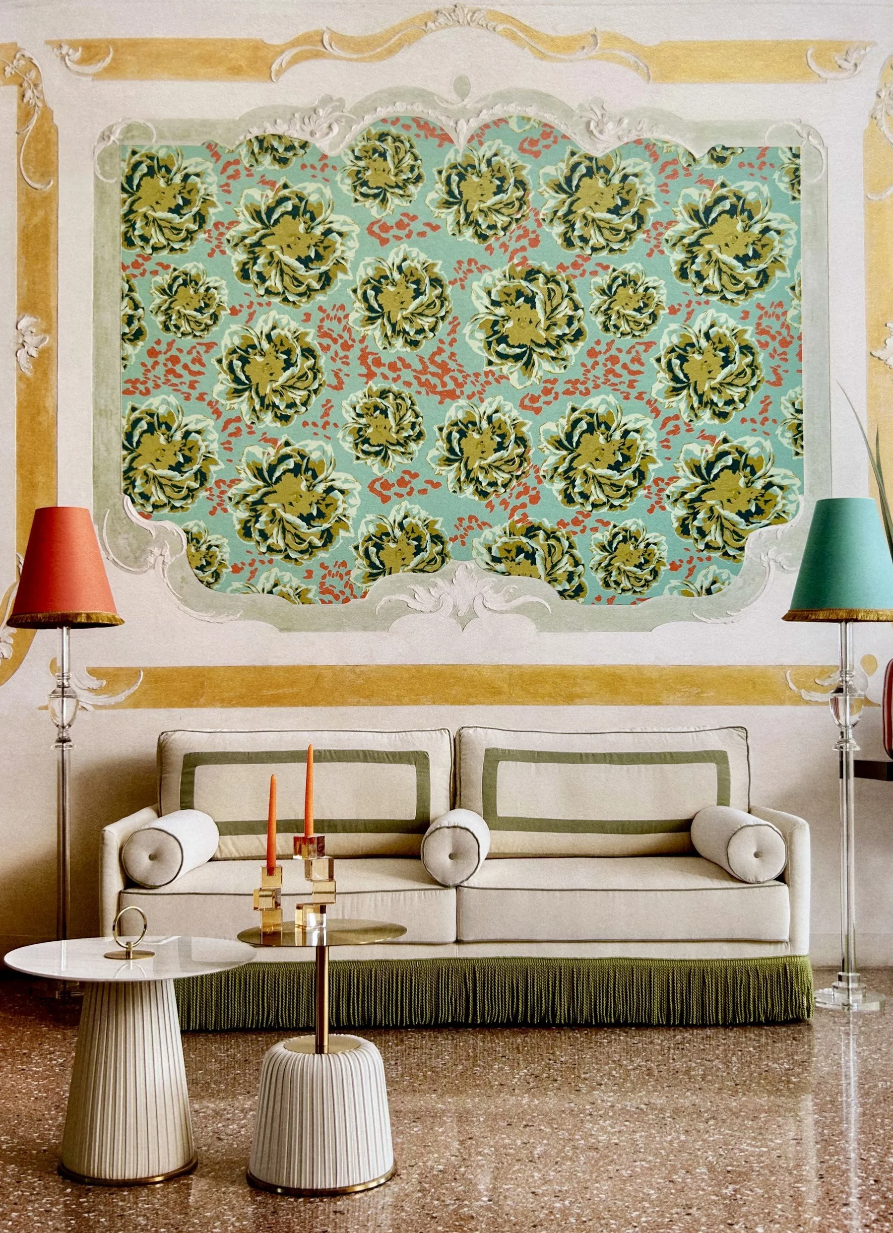 Lynette Reed floral wallpaper panel in a styled interior with a cream sofa