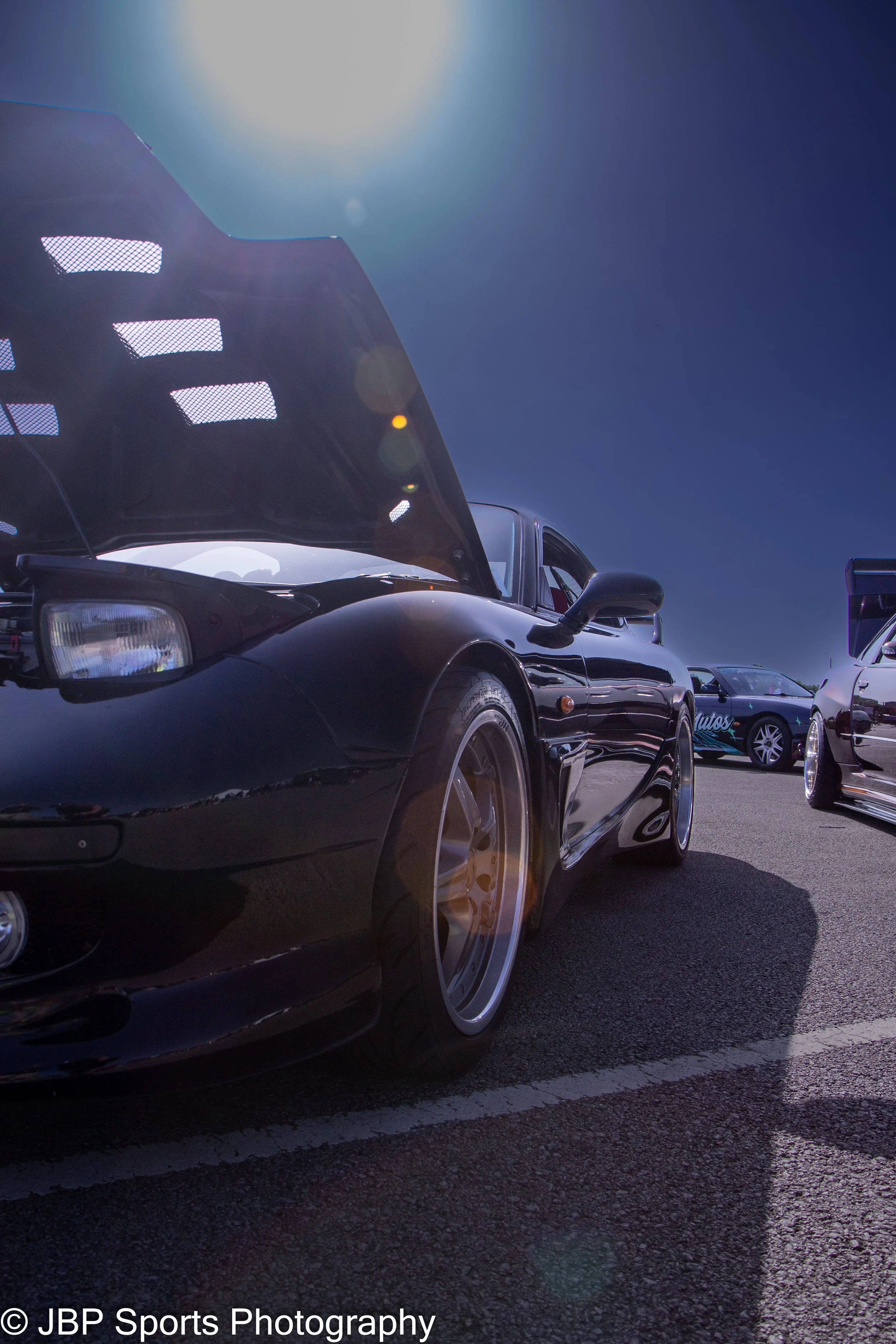 A resplendent Mazda RX7 Basking in the sun at JDM Jam Donington Park 