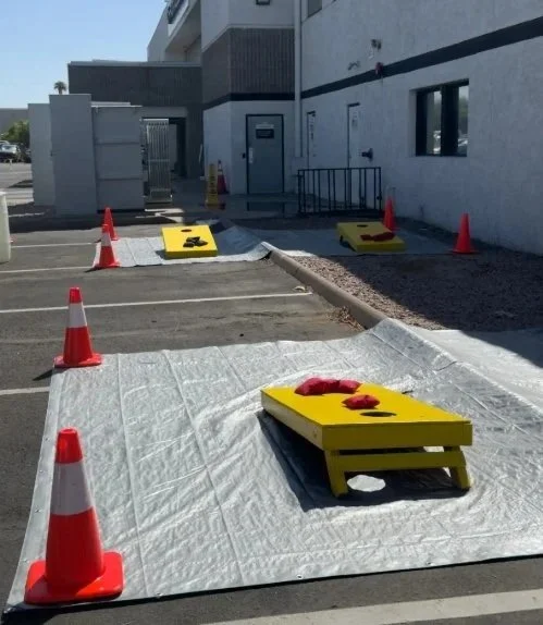 Cornhole game rental with two boards set up for an outdoor event in Phoenix, Arizona.