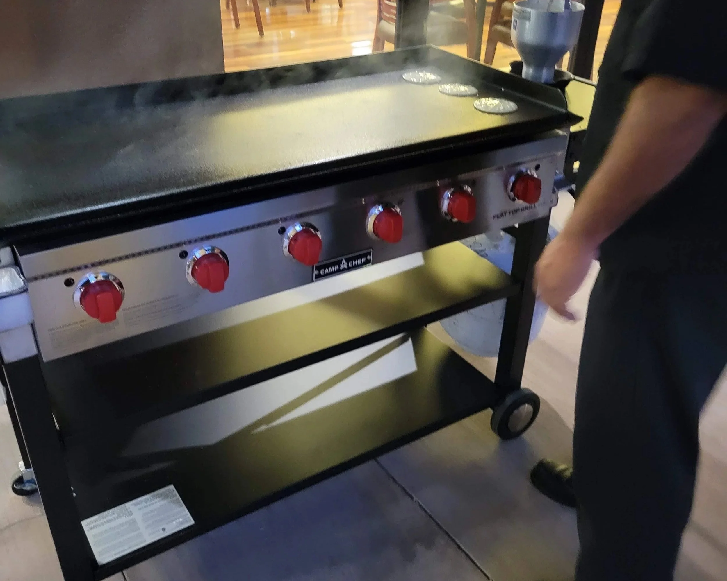 Commercial flat top griddle rental on a wheeled stand for parties, catering and events in Phoenix, Arizona.