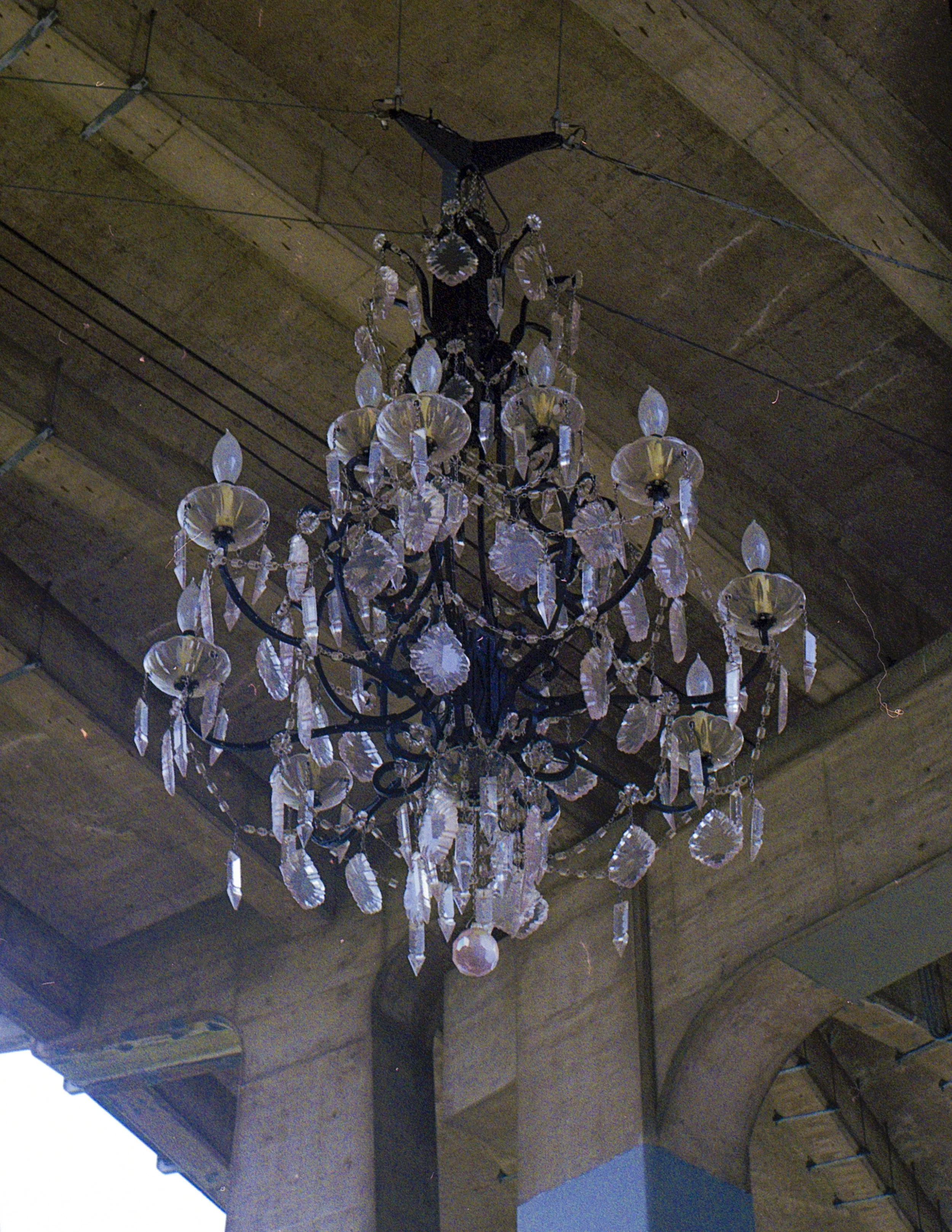 A spinning crystal chandelier hanging from the Granville bridge in Vancouver