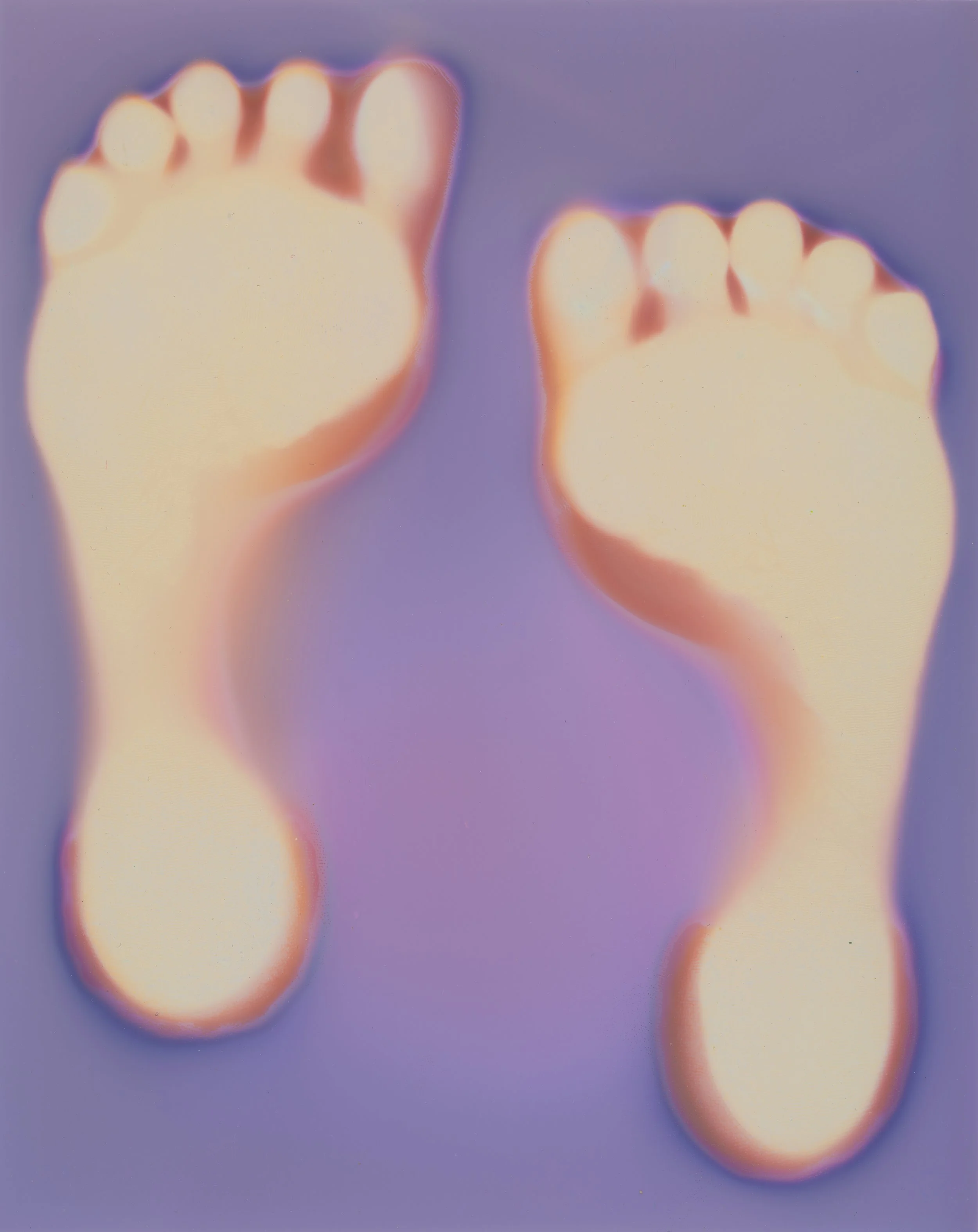feet print against a purple background, stylized with bright glow and soft focus.