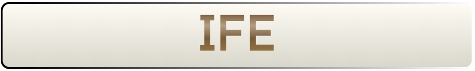 Close-up of a white button with the word 'LIFE' in brown capital letters.
