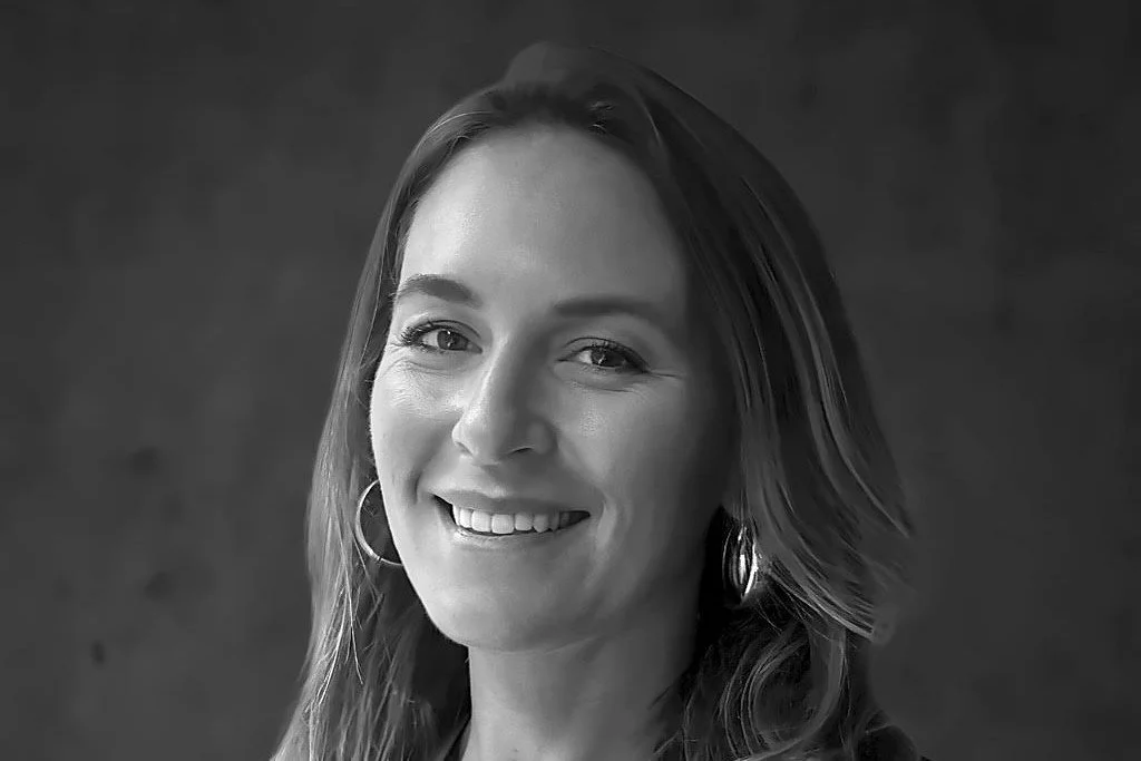 Black and white portrait of Danielle Bastow, Chief Operating Officer of DEY.